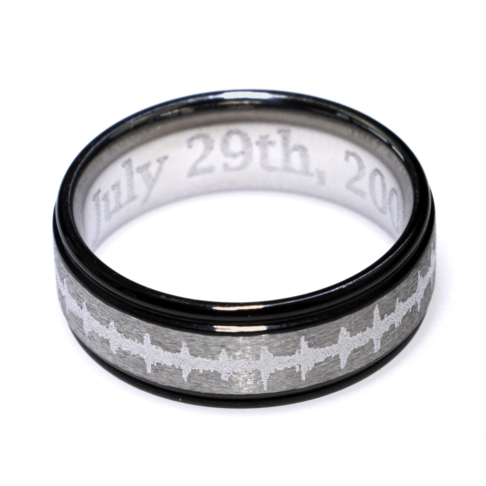 Our personalized stainless steel band for men makes the perfect ring for daddy. Engraved with text or your baby's actual heartbeat. USA Made, FREE Shipping!