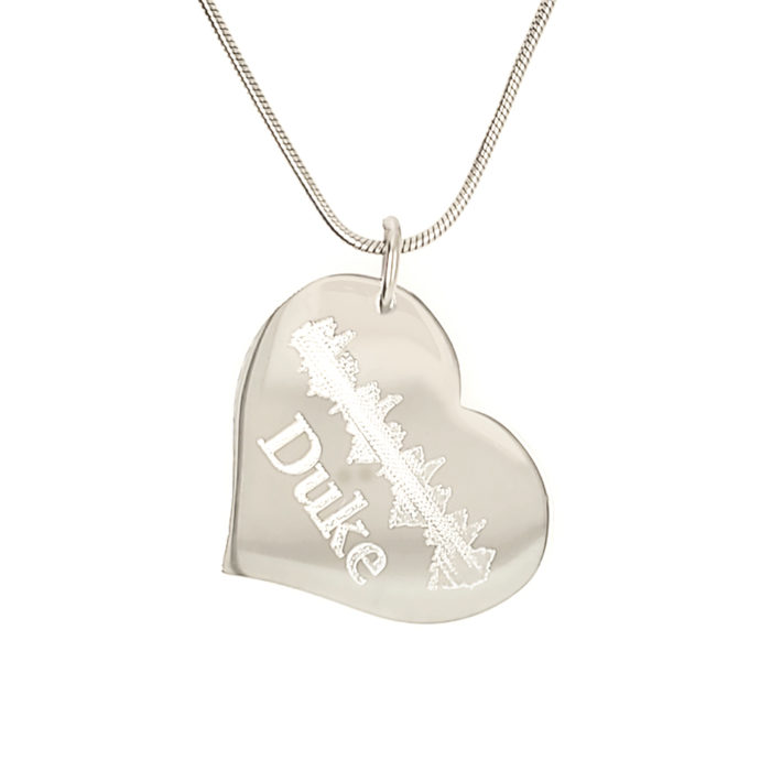 The Furbeat Heart Charm Necklace is the perfect piece and completely customized for your favorite pet! The front is engraved with your pet's name and can include your furbaby's heartbeat or unique soundwave from a bark, meow, purr, or any other sound you would like!